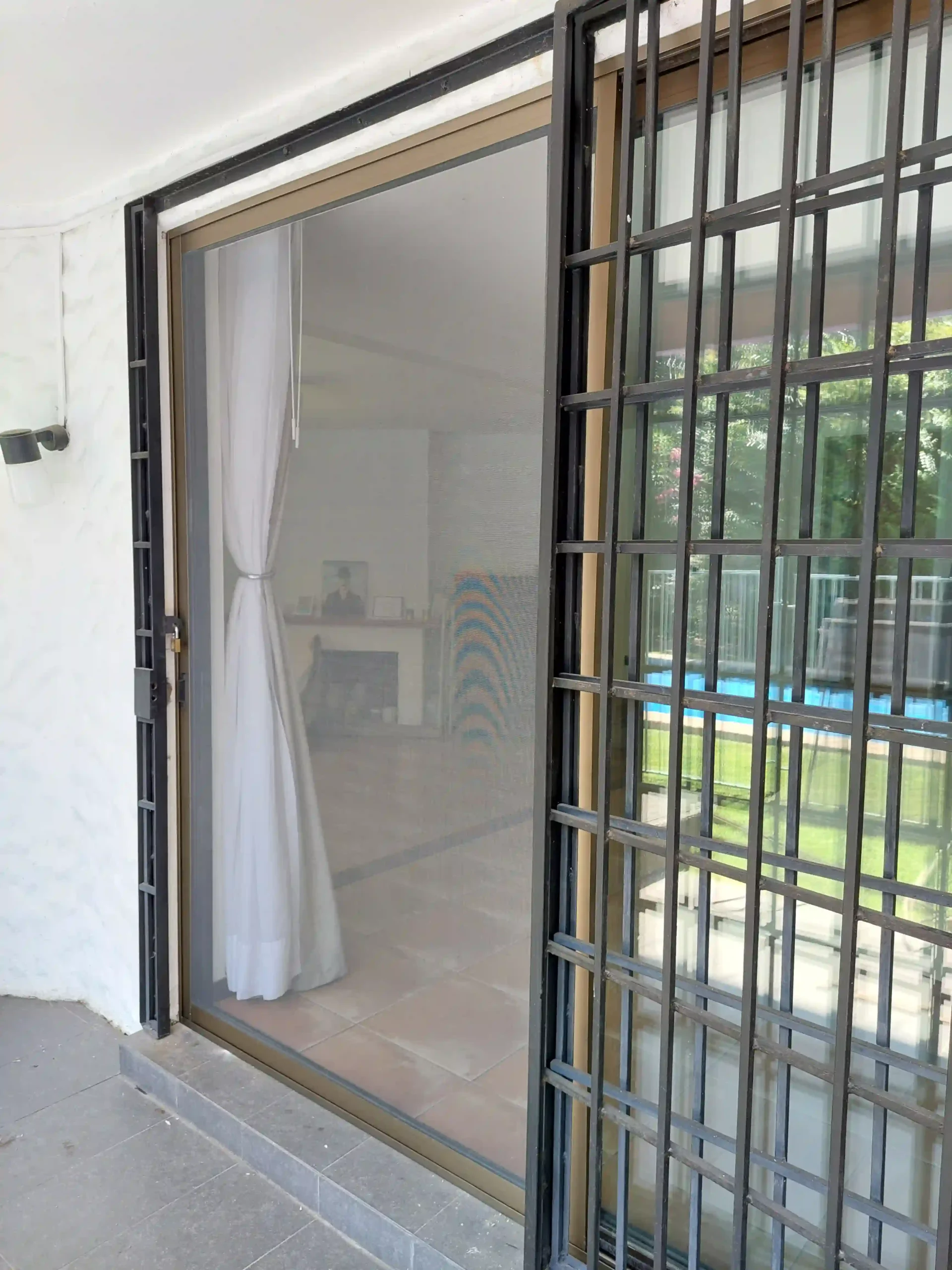 mosquitero-corredero-ventanal